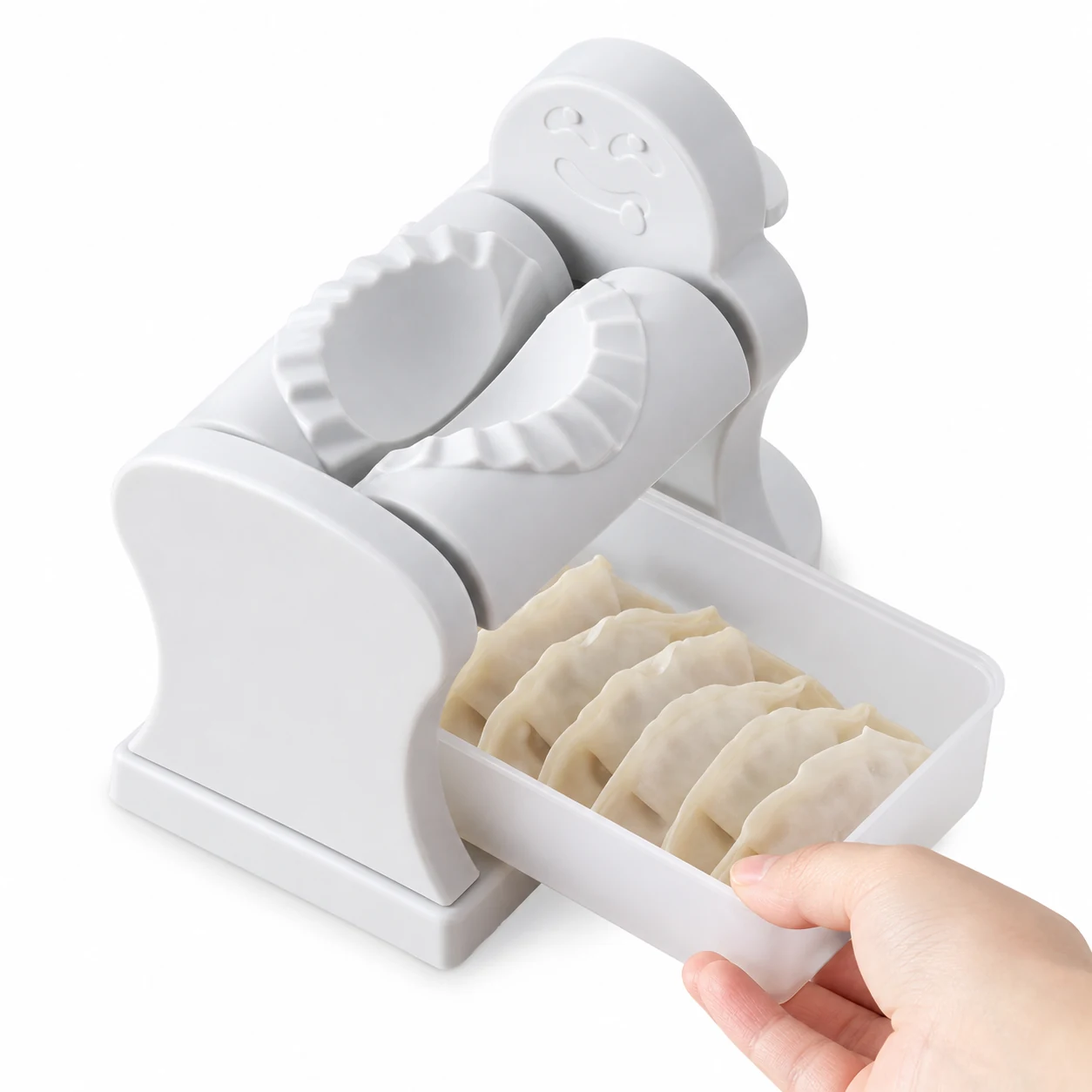 Automatic dumpling maker with removable collection tray