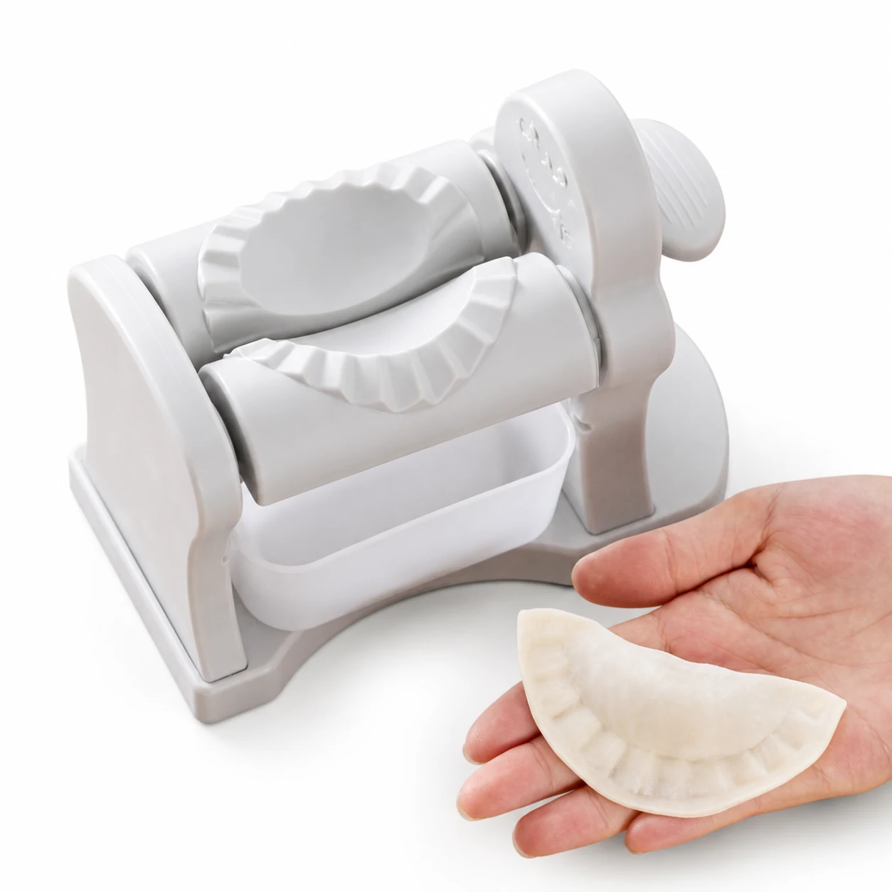 Finished sealed dumpling beside automatic dumpling mold