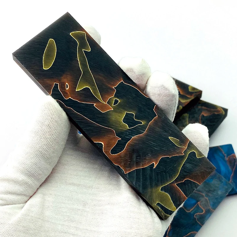 Black copper pattern resin knife handle scale close-up