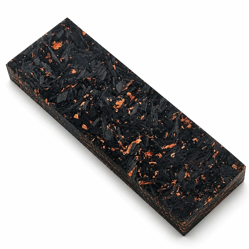 Carbon fiber handle material close-up with random fibers and copper flecks