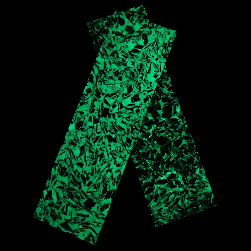 Carbon fiber handle material with green glow-in-the-dark resin