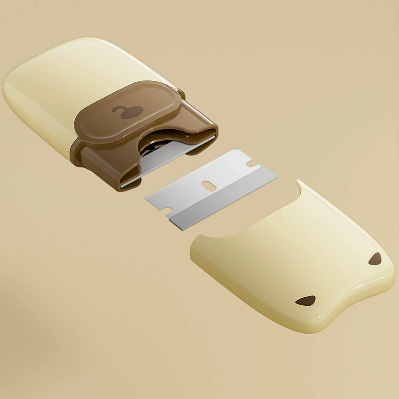 Portable razor blade scraper shown with cover and replaceable metal blade